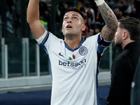 Lautaro Martinez of FC Internazionale celebrates after scoring first goal during the Serie A Enilive match between AS Roma and FC Internazio...