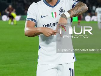 Lautaro Martinez of FC Internazionale celebrates after scoring first goal during the Serie A Enilive match between AS Roma and FC Internazio...