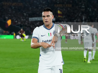 Lautaro Martinez of FC Internazionale celebrates after scoring first goal during the Serie A Enilive match between AS Roma and FC Internazio...