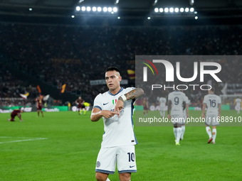 Lautaro Martinez of FC Internazionale celebrates after scoring first goal during the Serie A Enilive match between AS Roma and FC Internazio...