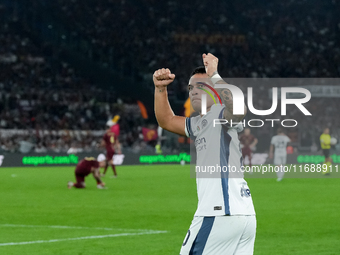 Lautaro Martinez of FC Internazionale celebrates after scoring first goal during the Serie A Enilive match between AS Roma and FC Internazio...