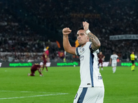 Lautaro Martinez of FC Internazionale celebrates after scoring first goal during the Serie A Enilive match between AS Roma and FC Internazio...