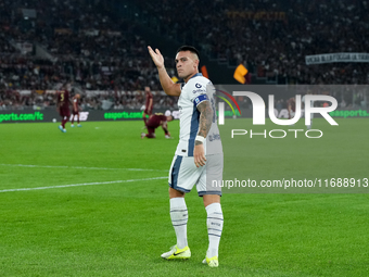 Lautaro Martinez of FC Internazionale celebrates after scoring first goal during the Serie A Enilive match between AS Roma and FC Internazio...