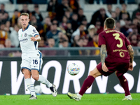 Davide Frattesi of FC Internazionale and Angelino of AS Roma during the Serie A Enilive match between AS Roma and FC Internazionale at Stadi...