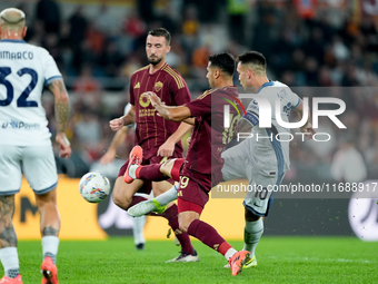 Lautaro Martinez of FC Internazionale scores first goal during the Serie A Enilive match between AS Roma and FC Internazionale at Stadio Oli...