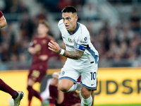 Lautaro Martinez of FC Internazionale celebrates after scoring first goal during the Serie A Enilive match between AS Roma and FC Internazio...