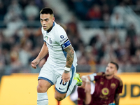 Lautaro Martinez of FC Internazionale celebrates after scoring first goal during the Serie A Enilive match between AS Roma and FC Internazio...