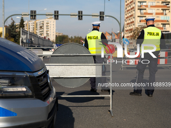 Police are present during the 10th Cracovia Royal Half Marathon at Tauron Arena in Krakow, Poland, on October 20, 2024. The Cracovia Royal H...