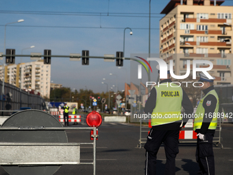 Police are present during the 10th Cracovia Royal Half Marathon at Tauron Arena in Krakow, Poland, on October 20, 2024. The Cracovia Royal H...