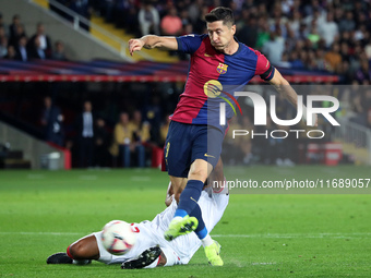 Robert Lewandowski and Marcao play during the match between FC Barcelona and Sevilla FC, corresponding to week 10 of LaLiga EA Sports, at th...