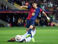 Robert Lewandowski and Marcao play during the match between FC Barcelona and Sevilla FC, corresponding to week 10 of LaLiga EA Sports, at th...