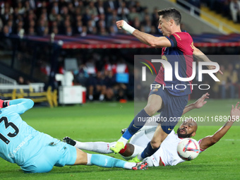 Robert Lewandowski, Marcao, and Orjan Nyland play during the match between FC Barcelona and Sevilla FC, corresponding to week 10 of LaLiga E...