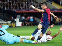 Robert Lewandowski, Marcao, and Orjan Nyland play during the match between FC Barcelona and Sevilla FC, corresponding to week 10 of LaLiga E...