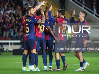 FC Barcelona players celebrate during the match between FC Barcelona and Sevilla FC, corresponding to week 10 of LaLiga EA Sports, at the Ll...