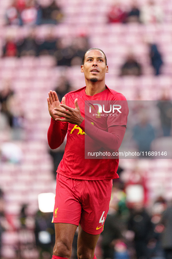 Liverpool's Virgil van Dijk warms up during the Premier League match between Liverpool and Chelsea at Anfield in Liverpool, England, on Octo...