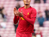 Liverpool's Virgil van Dijk warms up during the Premier League match between Liverpool and Chelsea at Anfield in Liverpool, England, on Octo...