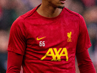 Trent Alexander-Arnold of Liverpool warms up during the Premier League match between Liverpool and Chelsea at Anfield in Liverpool, England,...