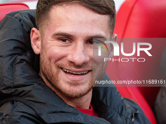 Liverpool's Alexis Mac Allister sits on the bench prior to the Premier League match between Liverpool and Chelsea at Anfield in Liverpool, E...