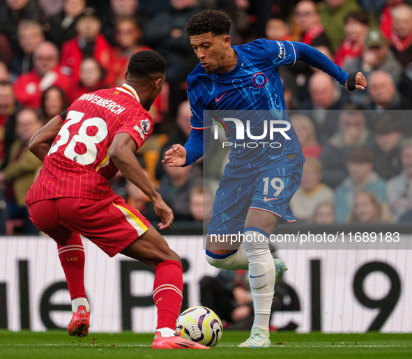 Jadon Sancho of Chelsea is in action with Liverpool's Ryan Gravenberch during the Premier League match between Liverpool and Chelsea at Anfi...