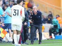 Manchester City's manager Pep Guardiola protests the referee's decision for VAR to check Stones' goal during the Premier League match betwee...