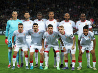 The Sevilla FC team plays during the match between FC Barcelona and Sevilla FC, corresponding to week 10 of LaLiga EA Sports, at the Lluis C...