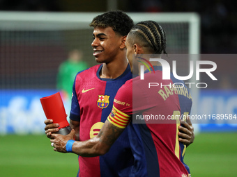 Raphinha gives Lamine Yamal the trophy for the best player of the month of September before the match between FC Barcelona and Sevilla FC, c...