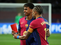 Raphinha gives Lamine Yamal the trophy for the best player of the month of September before the match between FC Barcelona and Sevilla FC, c...