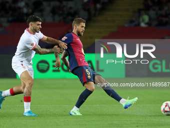 Inigo Martinez and Jose Angel Carmona play during the match between FC Barcelona and Sevilla FC, corresponding to week 10 of LaLiga EA Sport...