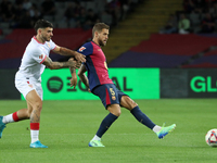 Inigo Martinez and Jose Angel Carmona play during the match between FC Barcelona and Sevilla FC, corresponding to week 10 of LaLiga EA Sport...