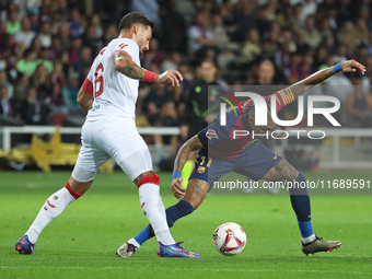 Raphinha Dias and Nemanja Gudelj play during the match between FC Barcelona and Sevilla FC, corresponding to week 10 of LaLiga EA Sports, at...