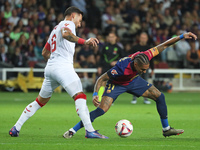 Raphinha Dias and Nemanja Gudelj play during the match between FC Barcelona and Sevilla FC, corresponding to week 10 of LaLiga EA Sports, at...