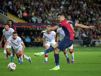 Robert Lewandowski scores a penalty during the match between FC Barcelona and Sevilla FC, corresponding to week 10 of LaLiga EA Sports, at t...