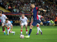 Robert Lewandowski scores a penalty during the match between FC Barcelona and Sevilla FC, corresponding to week 10 of LaLiga EA Sports, at t...