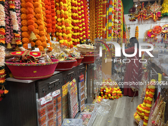 Women shop for Diwali decorations at a store selling puja items in preparation for the festival of Diwali in Mississauga, Ontario, Canada, o...