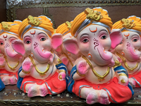 Small earthen idols of Lord Ganesh are displayed at a shop selling puja items in preparation for the festival of Diwali in Mississauga, Onta...