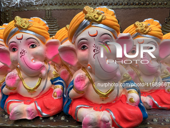 Small earthen idols of Lord Ganesh are displayed at a shop selling puja items in preparation for the festival of Diwali in Mississauga, Onta...