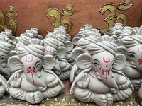 Small earthen idols of Lord Ganesh are displayed at a shop selling puja items in preparation for the festival of Diwali in Mississauga, Onta...