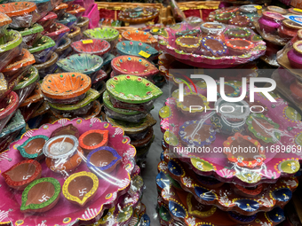 Colorful diyas (decorative earthen lamps) are at a shop selling puja items in preparation for the festival of Diwali in Mississauga, Ontario...