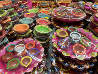 Colorful diyas (decorative earthen lamps) are at a shop selling puja items in preparation for the festival of Diwali in Mississauga, Ontario...