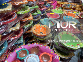 Colorful diyas (decorative earthen lamps) are at a shop selling puja items in preparation for the festival of Diwali in Mississauga, Ontario...