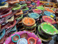 Colorful diyas (decorative earthen lamps) are at a shop selling puja items in preparation for the festival of Diwali in Mississauga, Ontario...