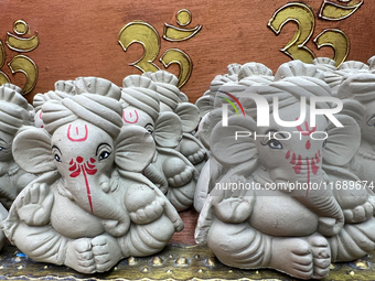 Small earthen idols of Lord Ganesh are displayed at a shop selling puja items in preparation for the festival of Diwali in Mississauga, Onta...