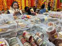 Women purchase bangles in preparation for the festival of Diwali in Mississauga, Ontario, Canada, on October 20, 2024. (