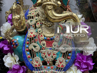 An idol of Lord Ganesh is at a shop selling puja items in preparation for the festival of Diwali in Mississauga, Ontario, Canada, on October...