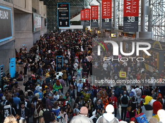 People check out the New York Comic Con 2024 at the Jacob Javits Center in New York City, United States, on October 20, 2024. New York Comic...