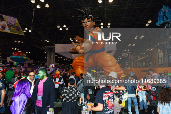 People check out the New York Comic Con 2024 at the Jacob Javits Center in New York City, United States, on October 20, 2024. New York Comic...