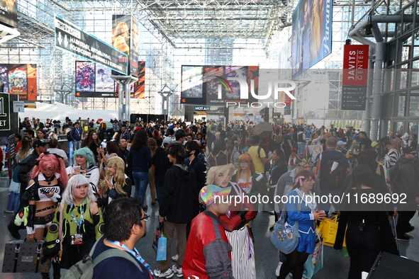 People check out the New York Comic Con 2024 at the Jacob Javits Center in New York City, United States, on October 20, 2024. New York Comic...