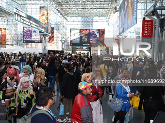 People check out the New York Comic Con 2024 at the Jacob Javits Center in New York City, United States, on October 20, 2024. New York Comic...