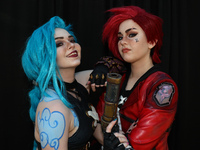 Cosplayers Stella and Lex from New York portray Jinx and Vi from Arcane for New York Comic Con at the Javits Center in New York City on Octo...