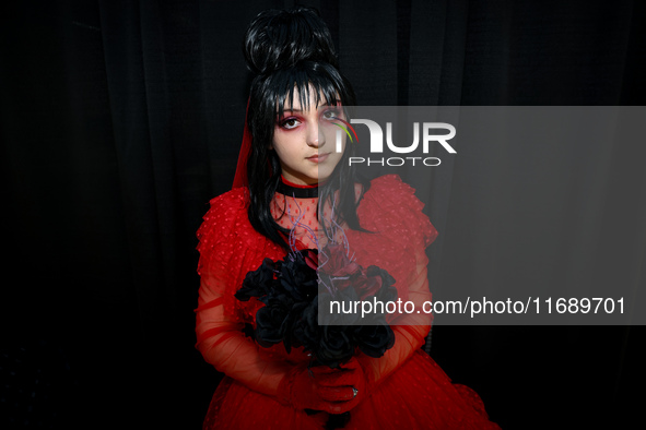 Cosplayer Manon from New York City dresses as a character from Beetlejuice for New York Comic Con at the Javits Center in New York City, on...